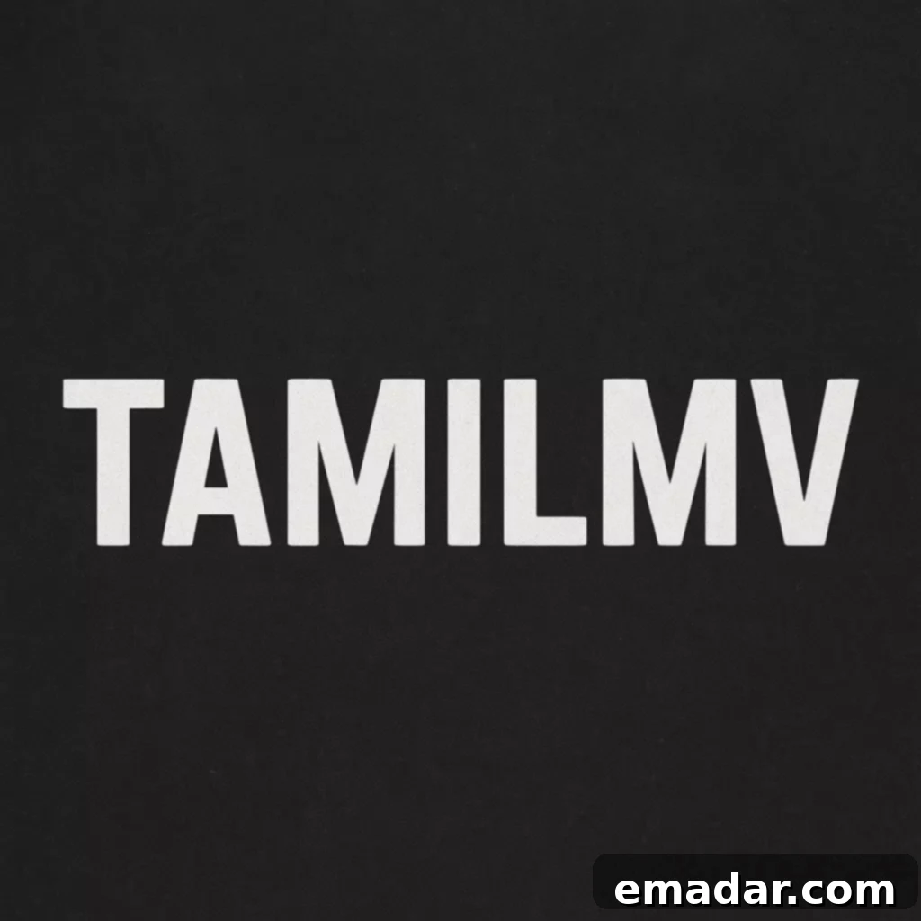 Tamilmv: What It Is and Why Users Search for It Online A person watching a movie on a laptop with Tamilmv branding